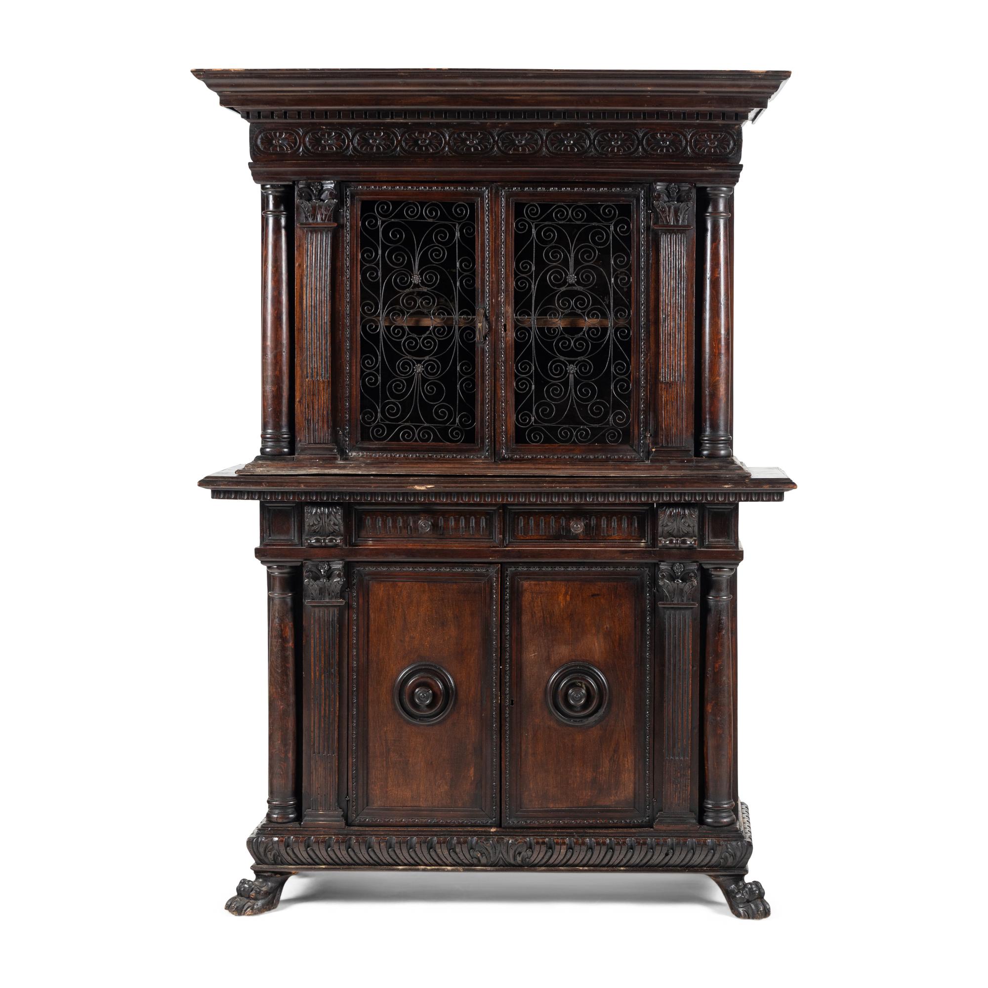 An Italian Renaissance Style Carved Walnut Cabinet