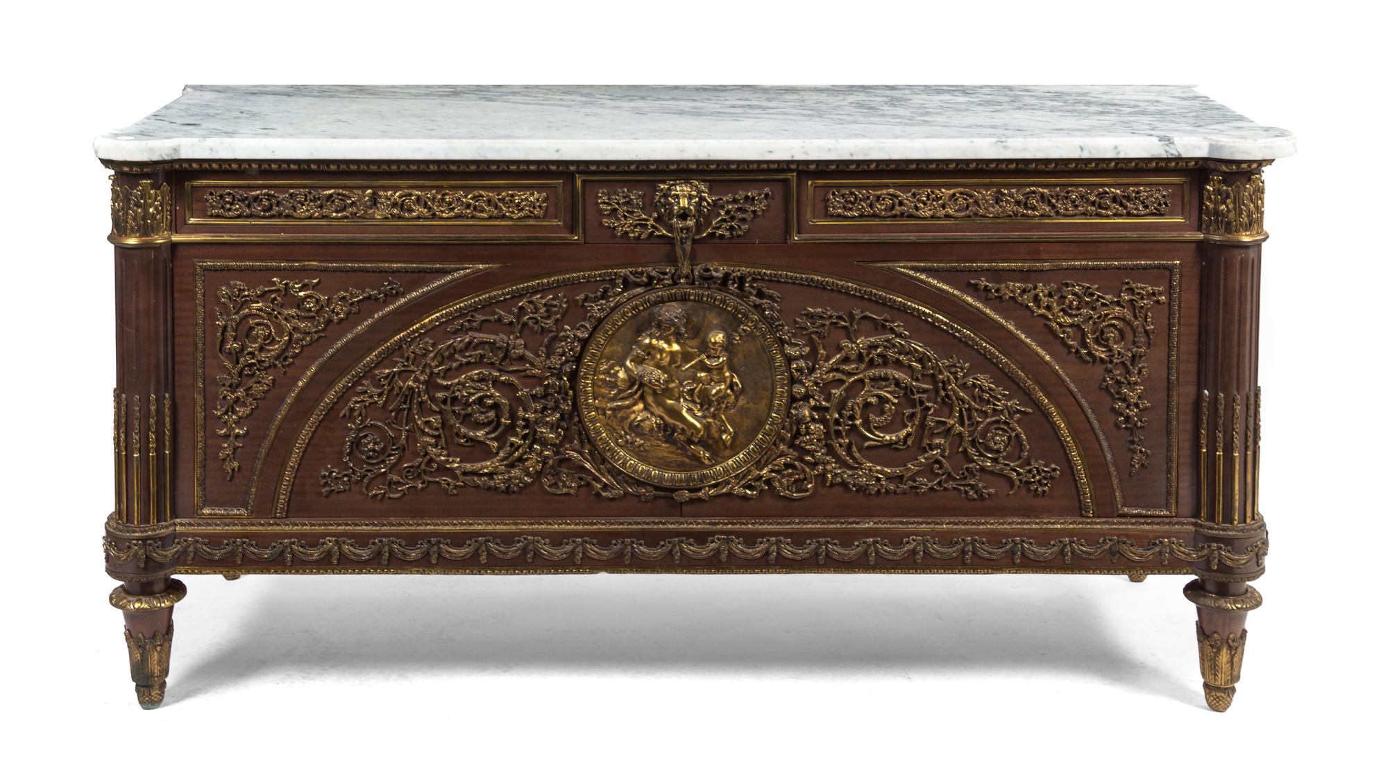A Louis XVI Style Gilt Bronze Mounted Commode, after a model by Guillaume Benneman, Height 36 1/4 x width 71 x depth 26 1/2 inches.