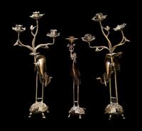 Three Chinese Bronze 'Turtle and Crane' Candle Holders