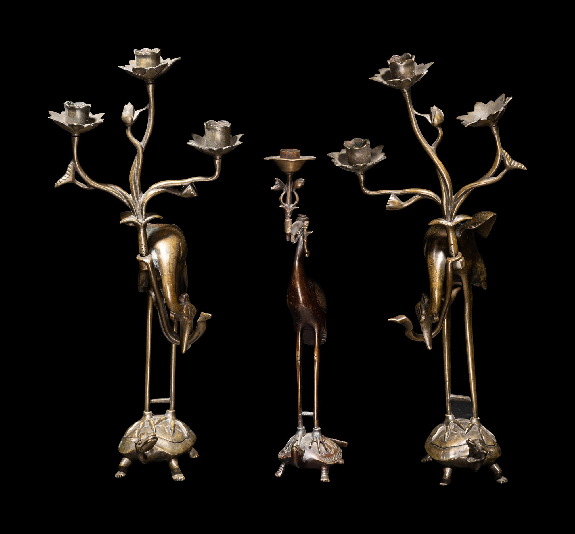Three Chinese Bronze 'Turtle and Crane' Candle Holders