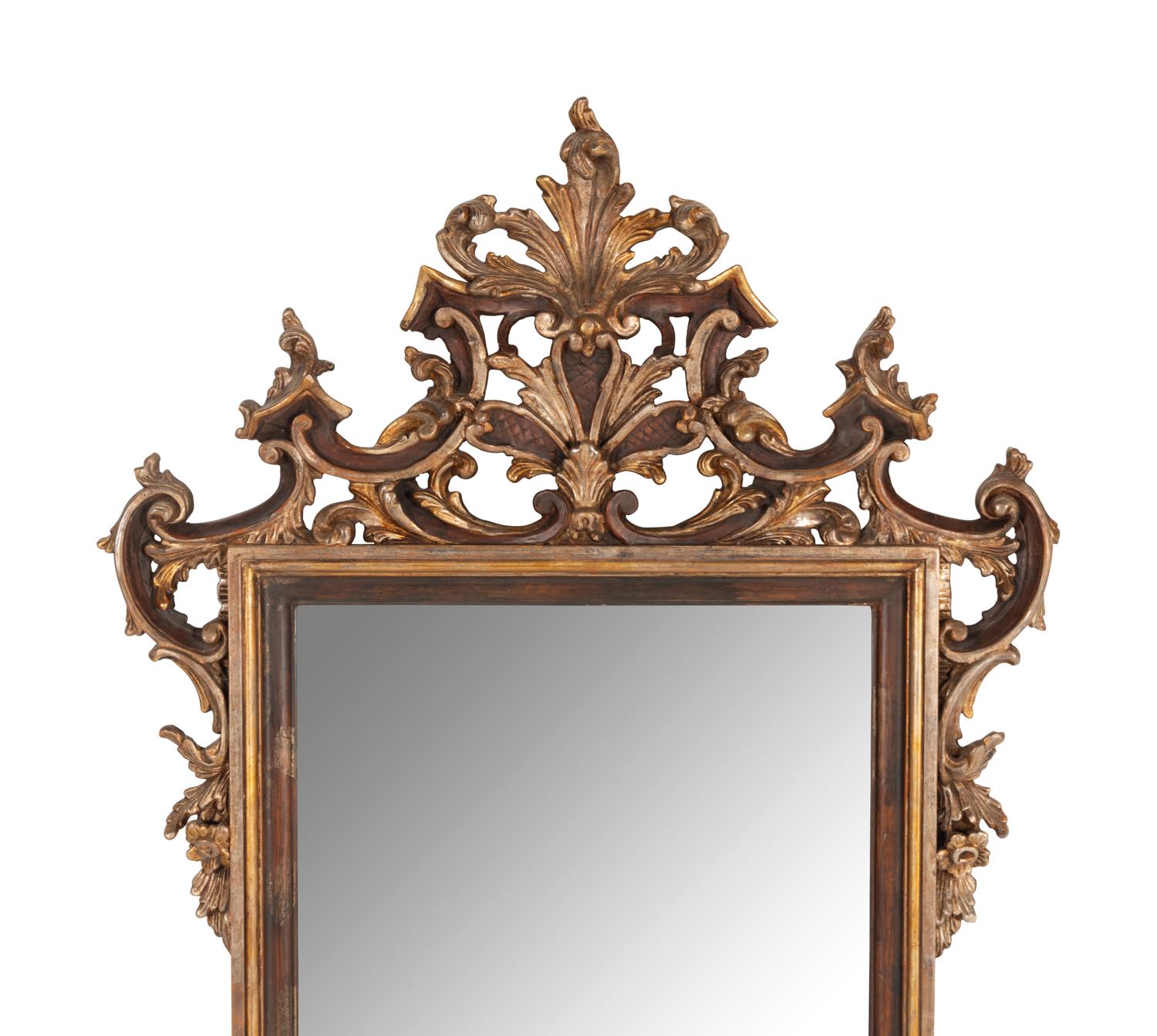 An Italian Baroque Style Carved and Parcel Gilt Mirror