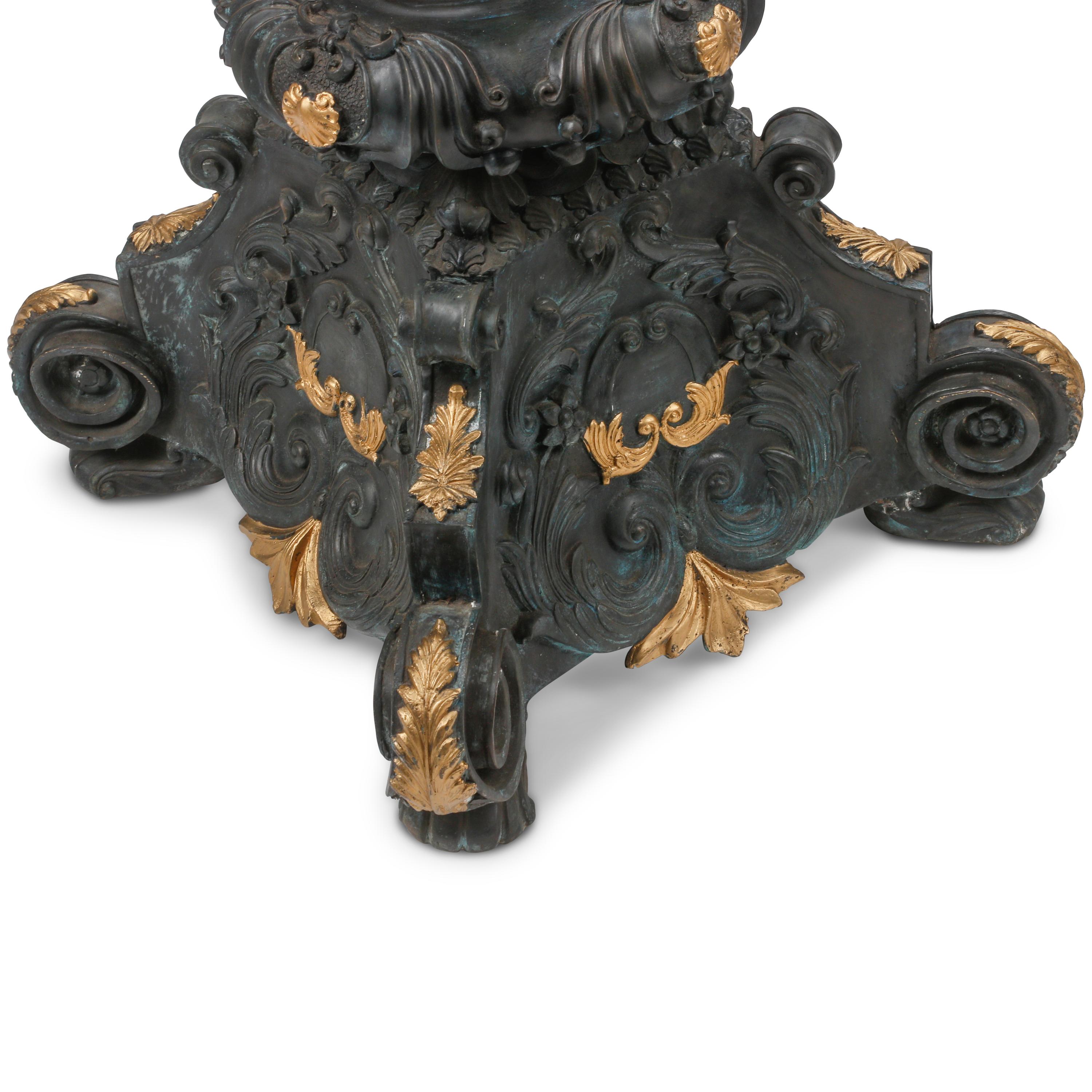 A Pair of Régence Style Patinated and Parcel Gilt Bronze Pedestals