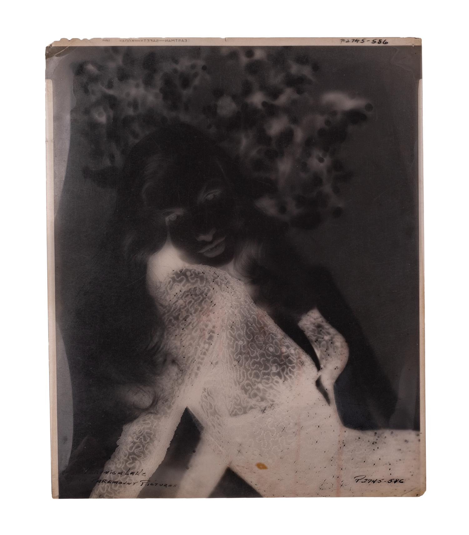[HOLLYWOOD PHOTOGRAPHY]. A group of 17 photographic portrait negatives and transparencies of Veronica Lake. c. 1940.