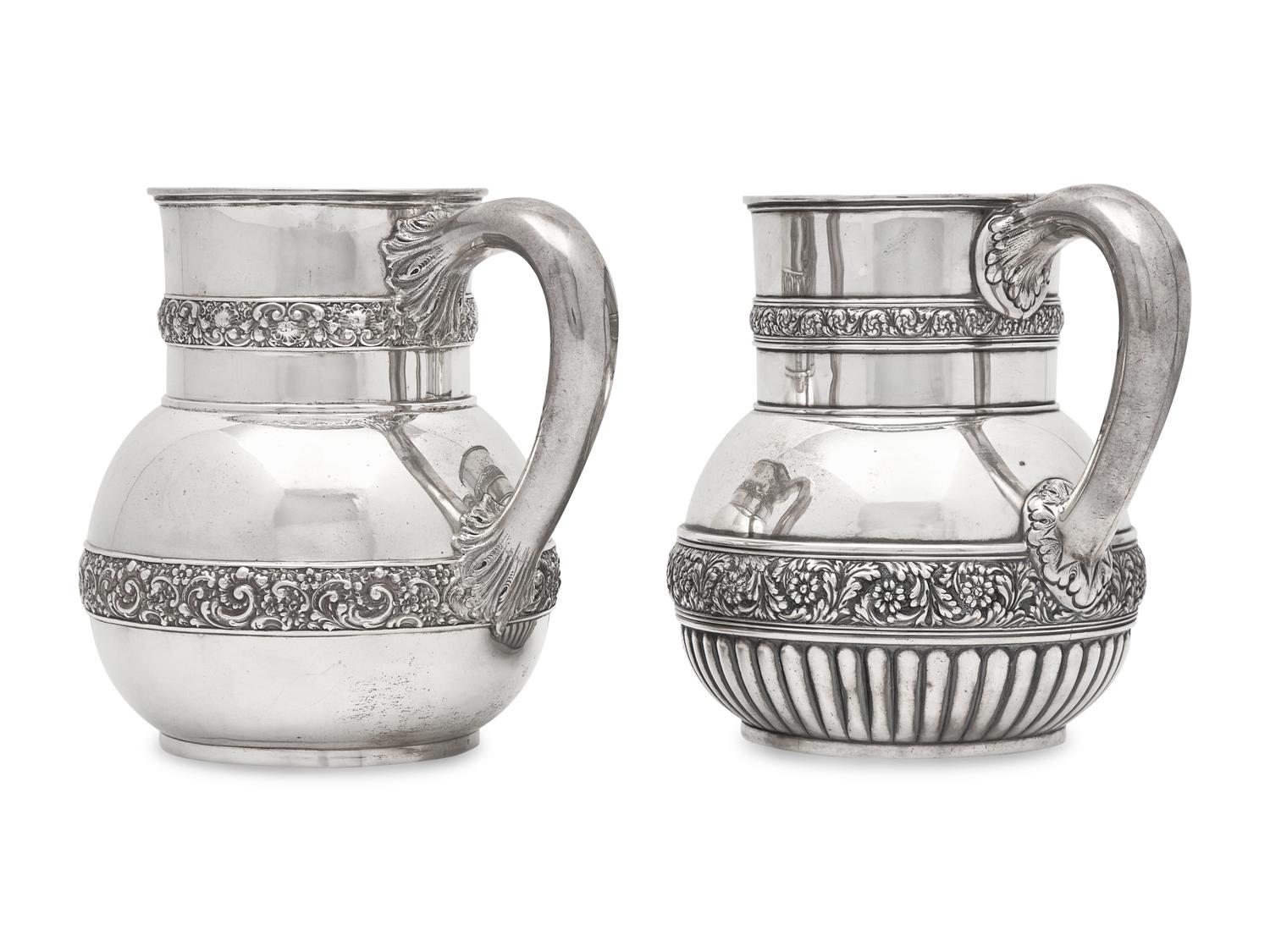 Two Similar Sterling Silver Floral Repousse Water Pitchers, Tiffany & Co., New York, NY, Circa 1880-1890s