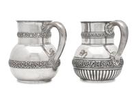 Two Similar Sterling Silver Floral Repousse Water Pitchers, Tiffany & Co., New York, NY, Circa 1880-1890s