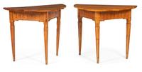 A Pair of Continental Carved Fruitwood Console Tables