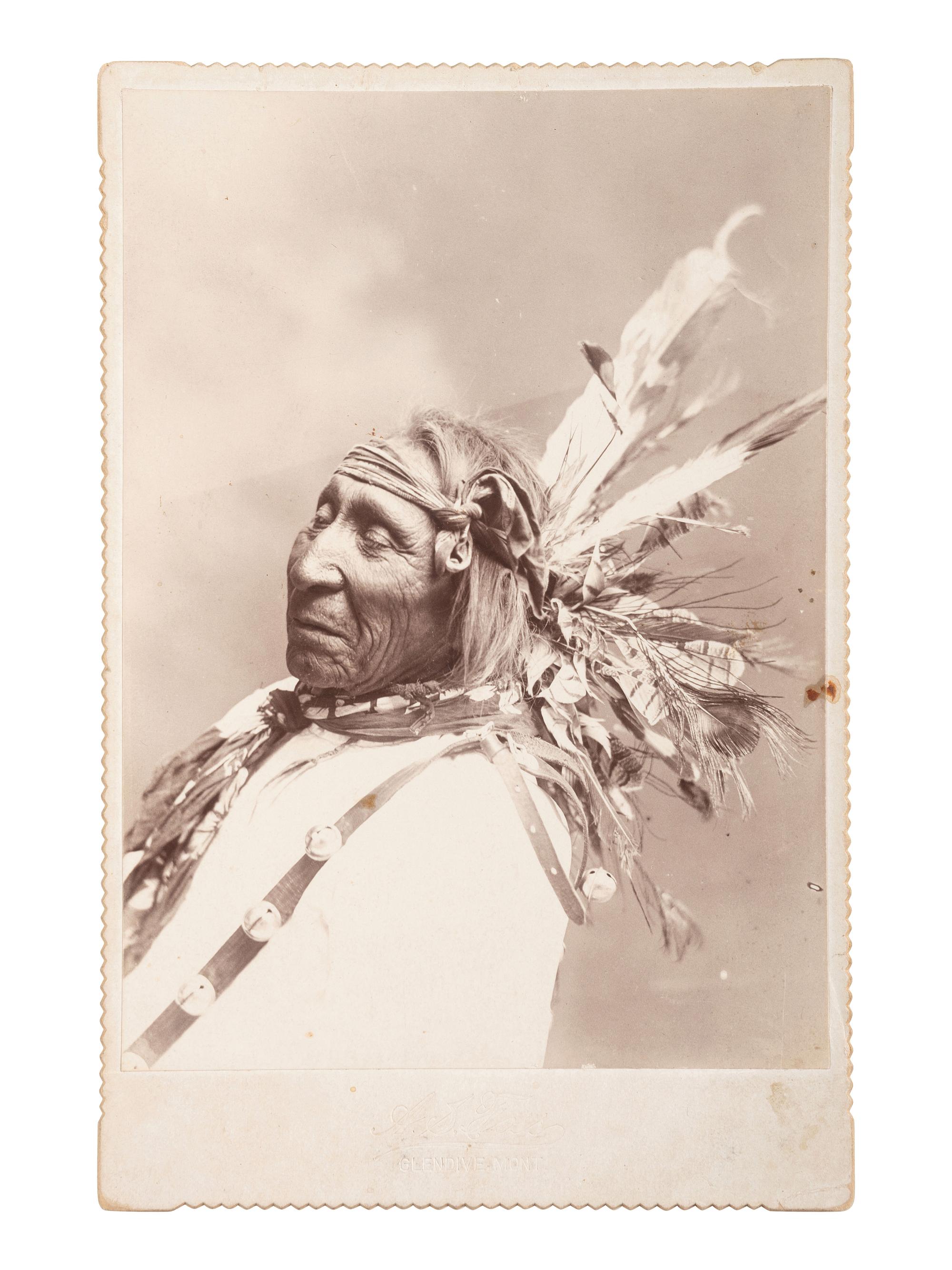 [NATIVE AMERICANS]. Cabinet card portrait of an elderly Sioux subject. Glendive, MT: A.S. Foss, n.d.