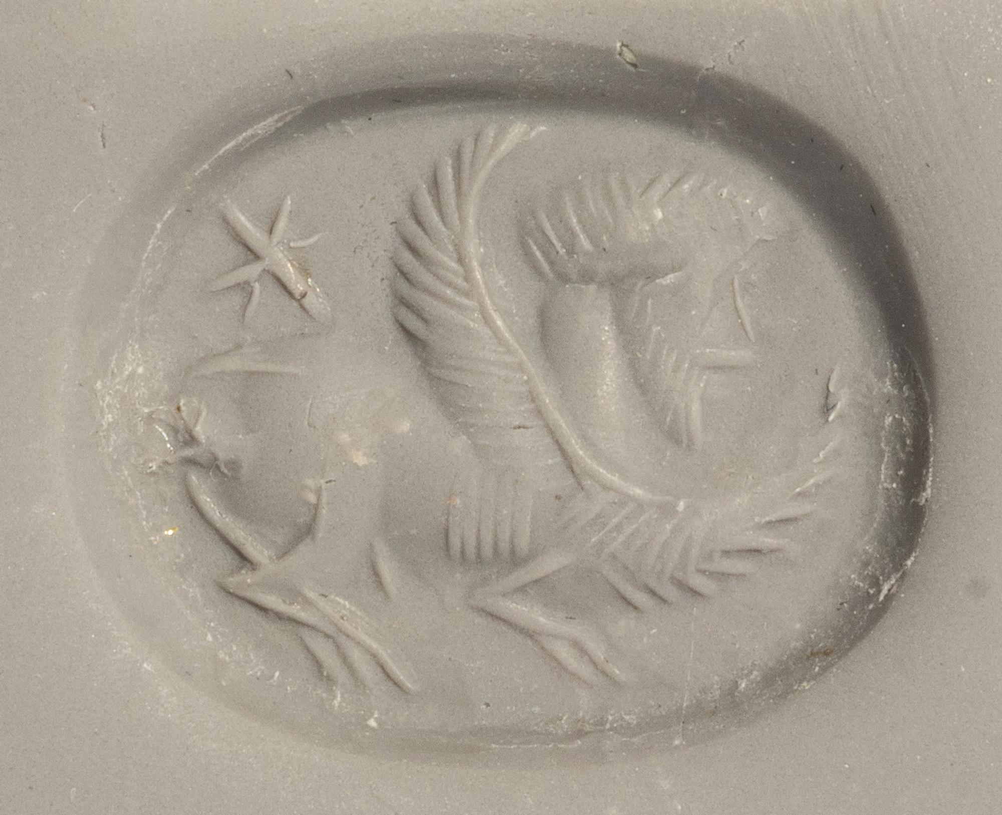 A Sasanian Banded Agate Stamp Seal