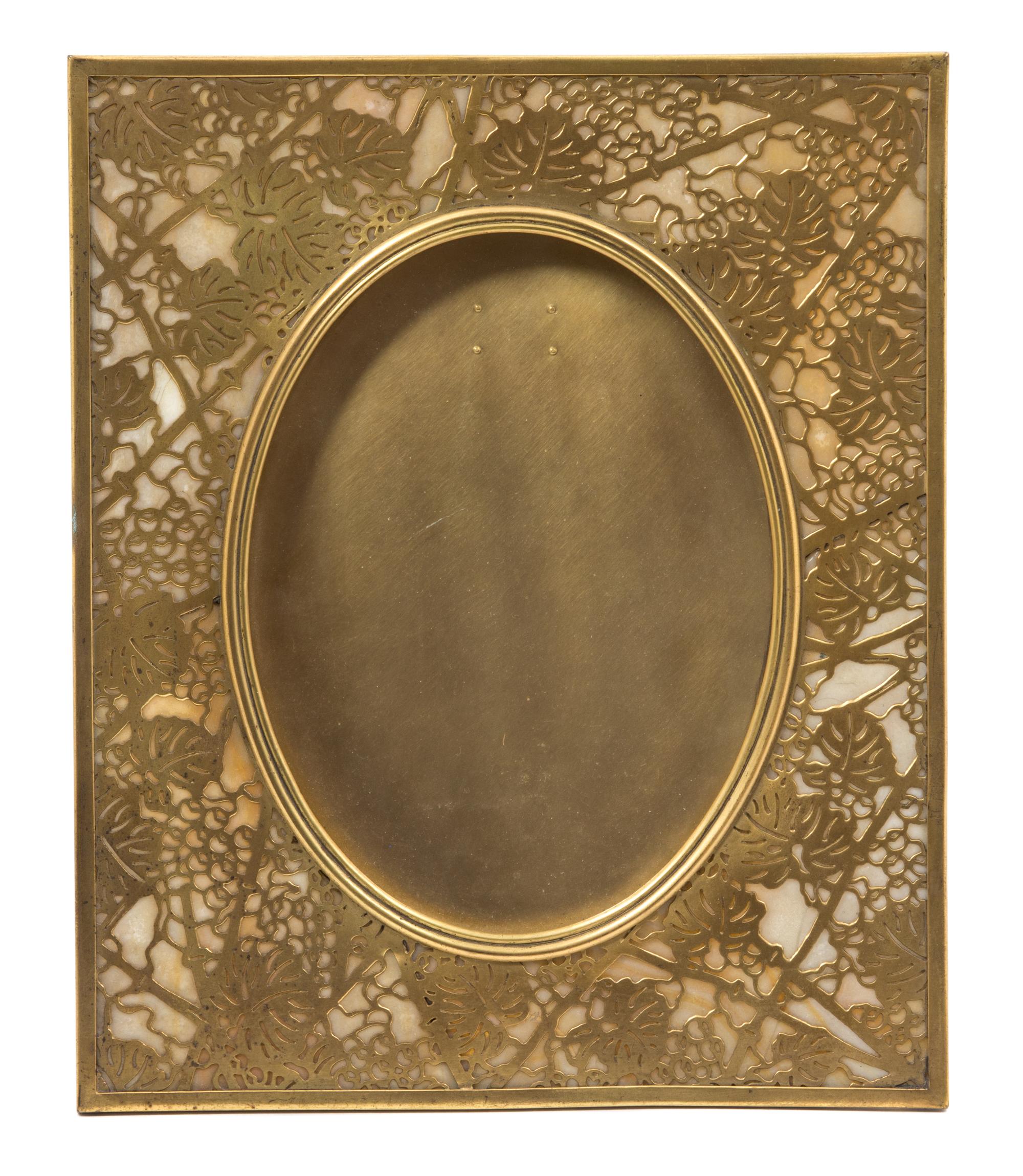 A Tiffany Studios Gilt Bronze Picture Frame 11 5/8 x 9 5/8 inches. — 20TH CENTURY
