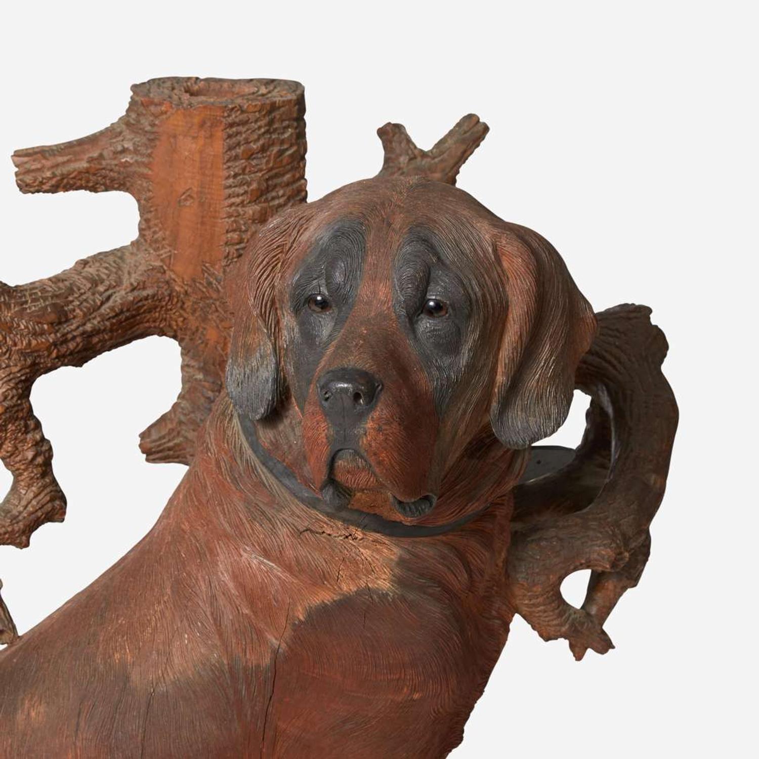 A Black Forest carved walnut hall stand with faux bois stump and English Labrador Swiss or German, late 19th / early 20th century
