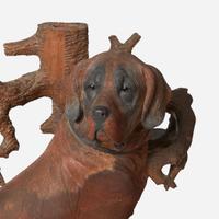 A Black Forest carved walnut hall stand with faux bois stump and English Labrador Swiss or German, late 19th / early 20th century