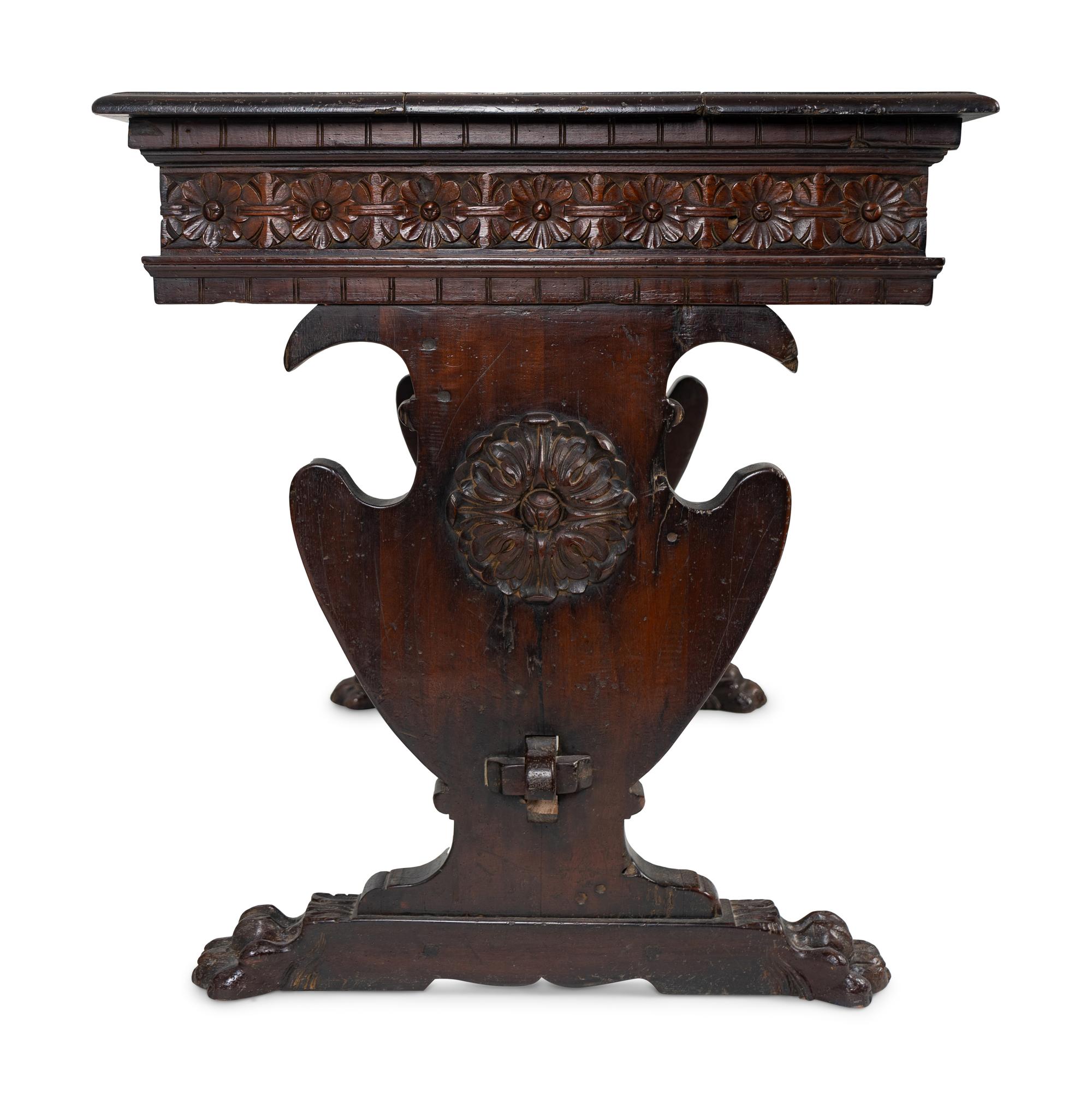 A Spanish Colonial Style Carved Walnut Desk and Chair — 19TH/20TH CENTURY