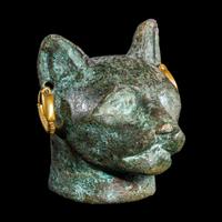 An Egyptian Bronze Head of a Cat