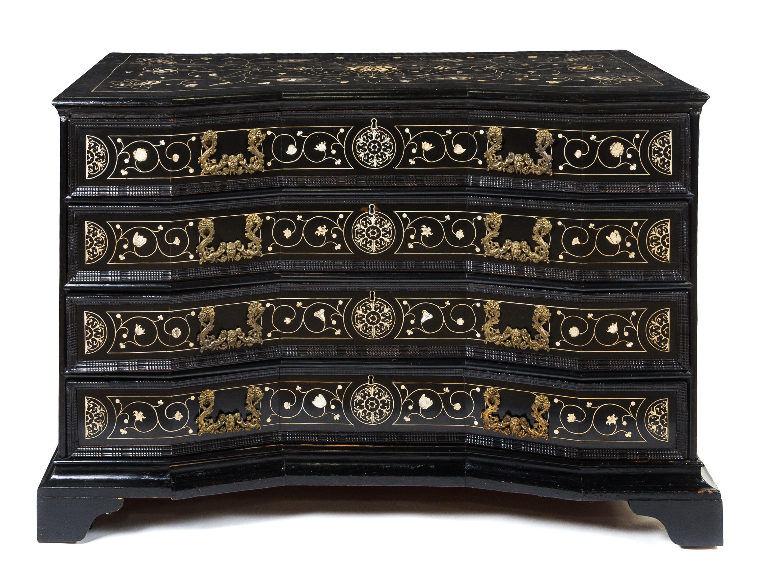 An Italian Ebony Chest of Drawers Height 40 1/4 x width 50 1/2 x depth 26 1/2 inches. — 17TH/18TH CENTURY