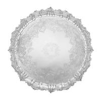An Irish George III Silver Salver, Jas. Le Bass for Alderman West, Dublin, 1813, the undulating border worked to show rocaille, S-scrol