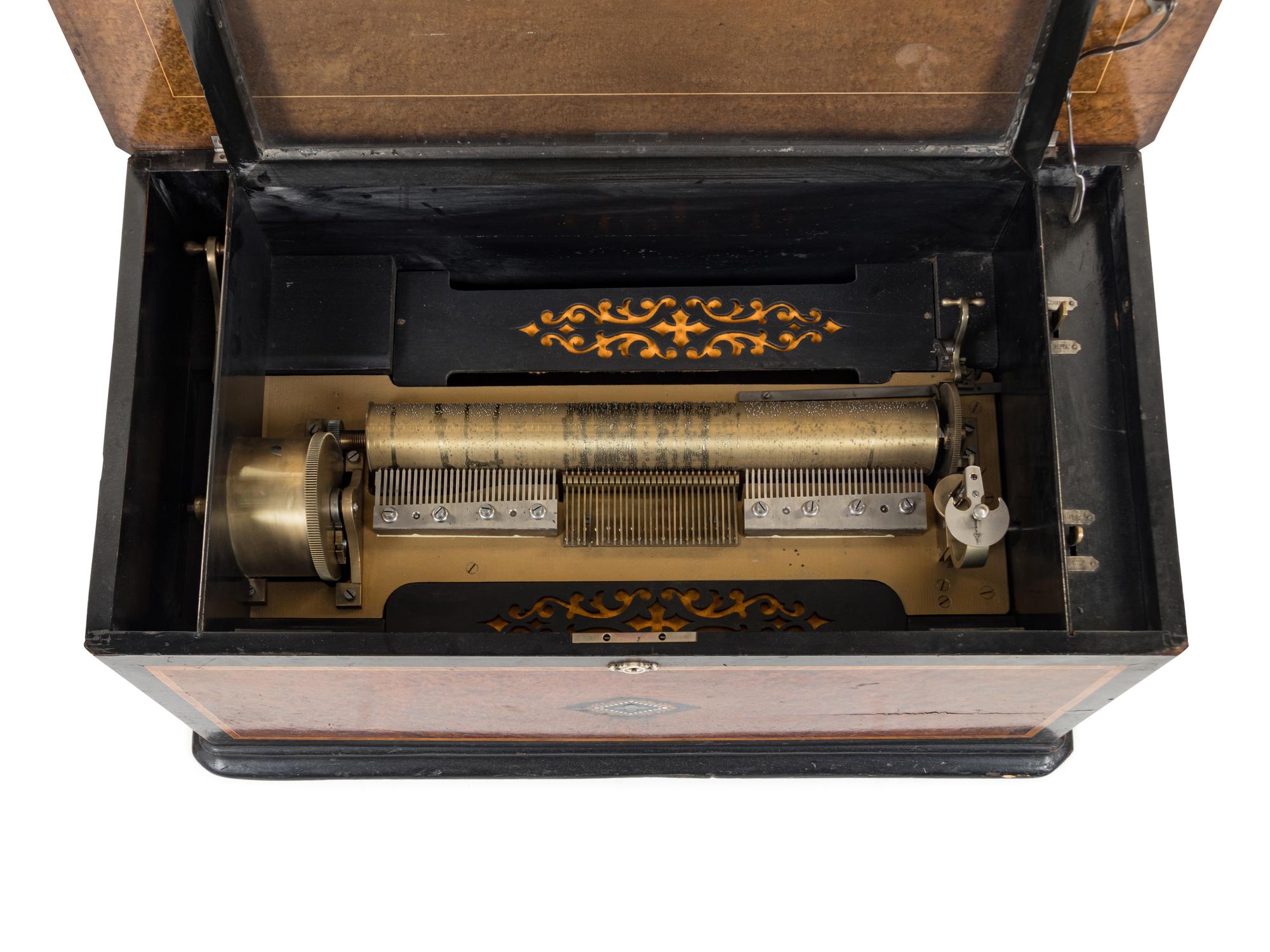 A Swiss Parcel Ebonized Cylinder Music Box
