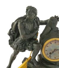 A Louis Phillippe Gilt and Patinated Bronze Mantel Clock