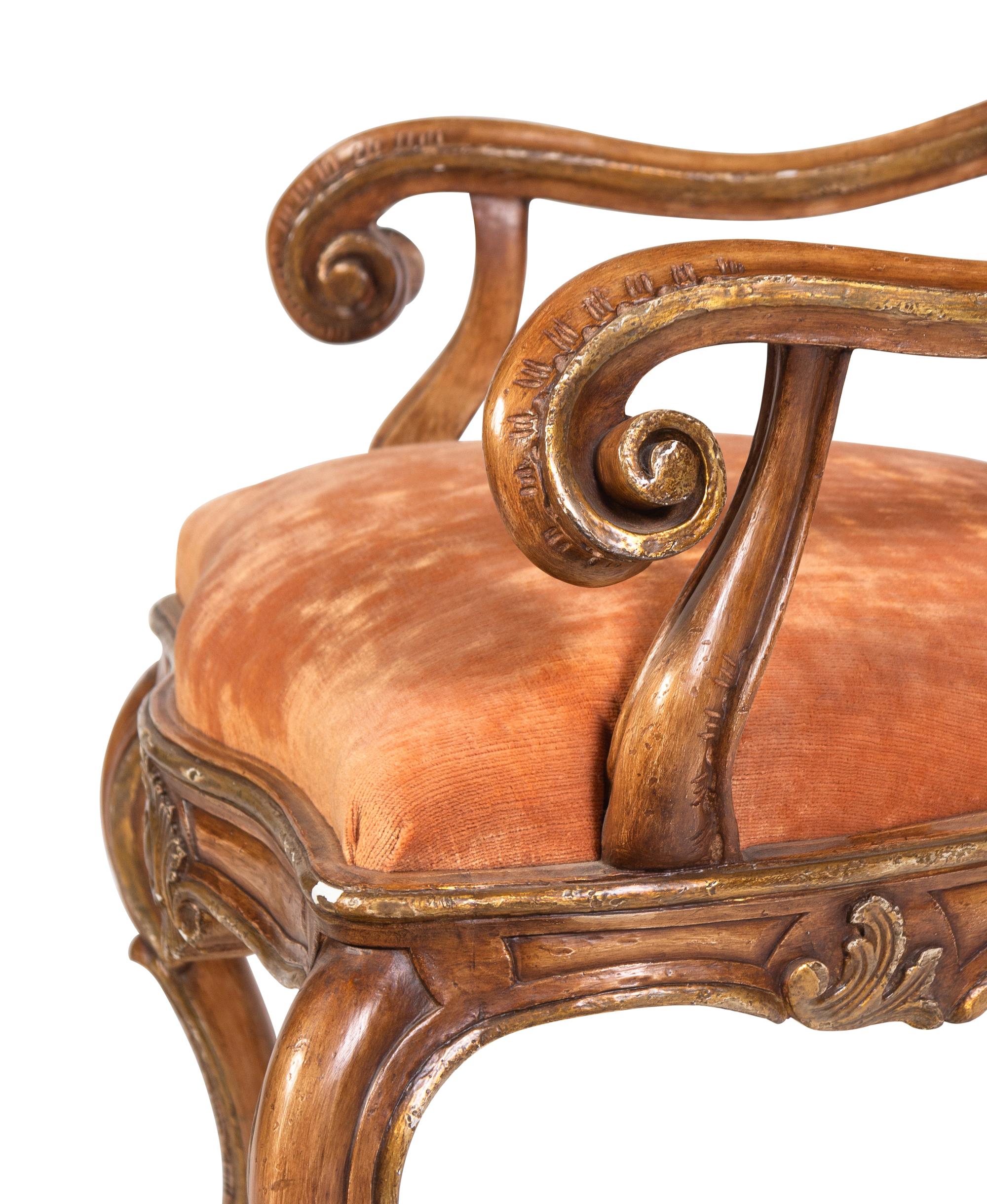 A Pair of Italian Rococo Style Carved and Painted Armchairs
