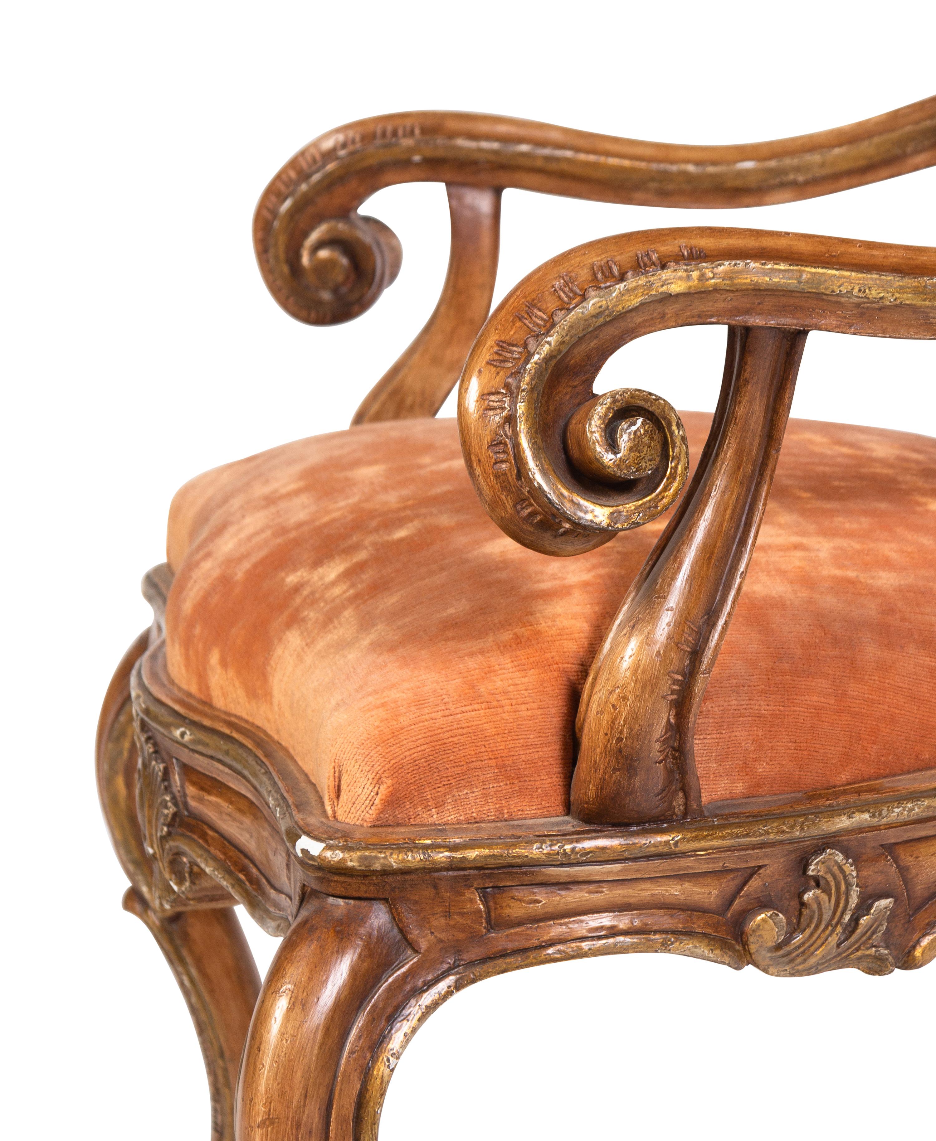 A Pair of Italian Rococo Style Carved and Painted Armchairs