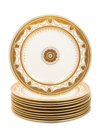 Two Sets of Gilt Porcelain Dinner Plates