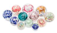 A Collection of Glass Paperweights Diameter of largest 3 1/2 inches