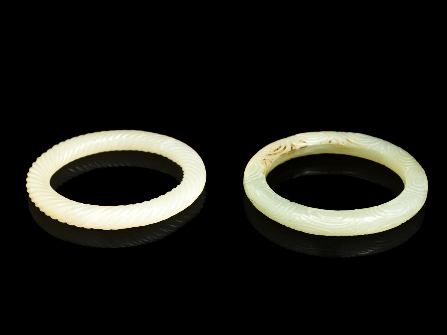 Two Chinese Celadon Jade Carved Bangles