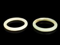 Two Chinese Celadon Jade Carved Bangles