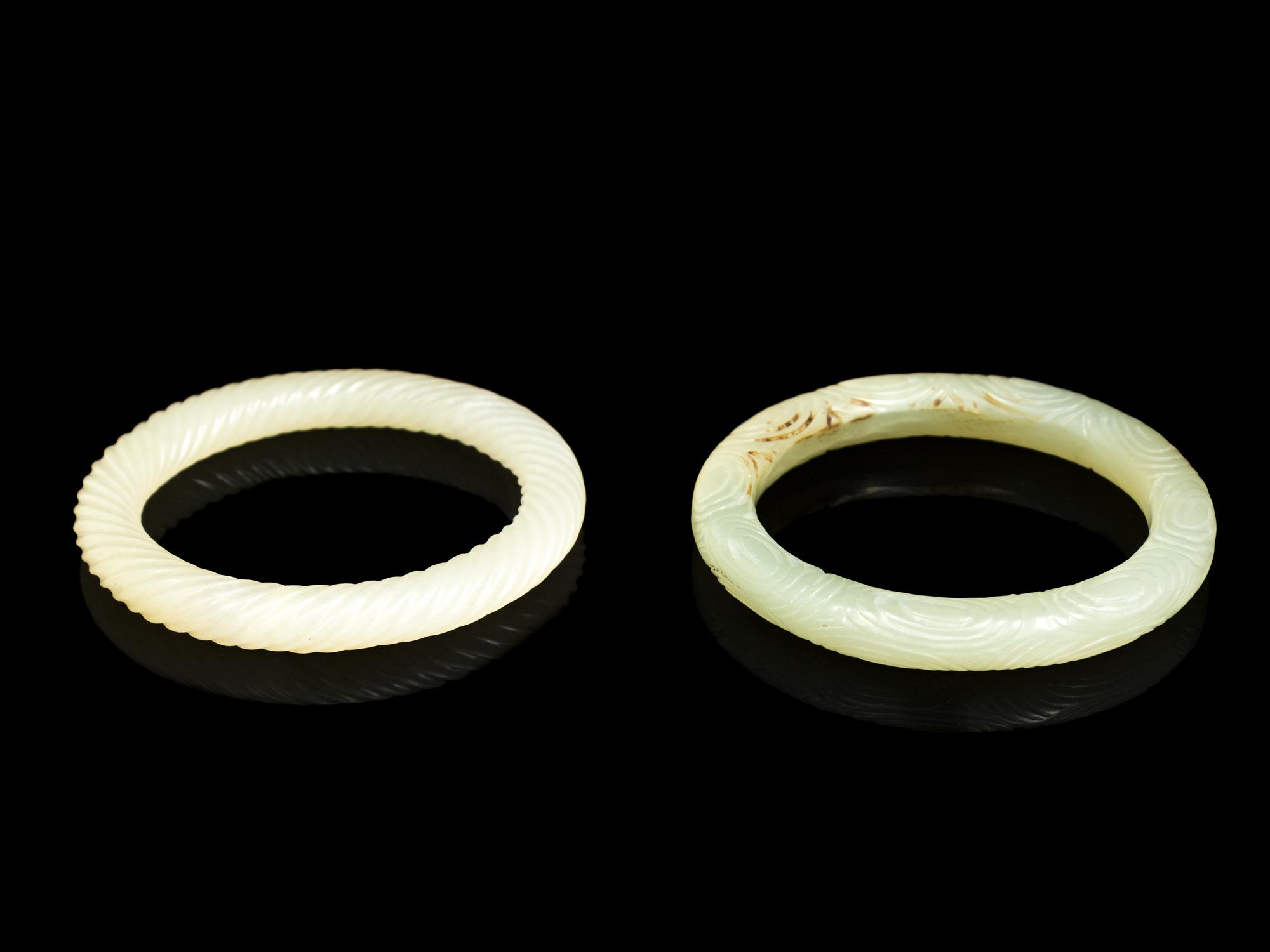 Two Chinese Celadon Jade Carved Bangles