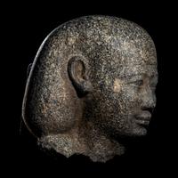 An Egyptian Granite Head of a Man