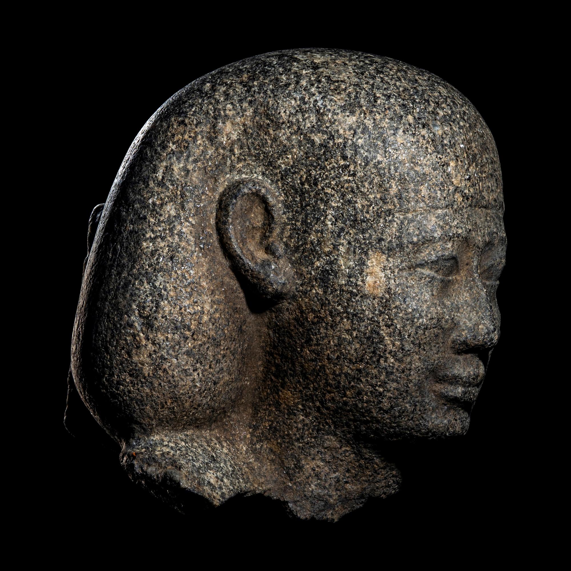 An Egyptian Granite Head of a Man