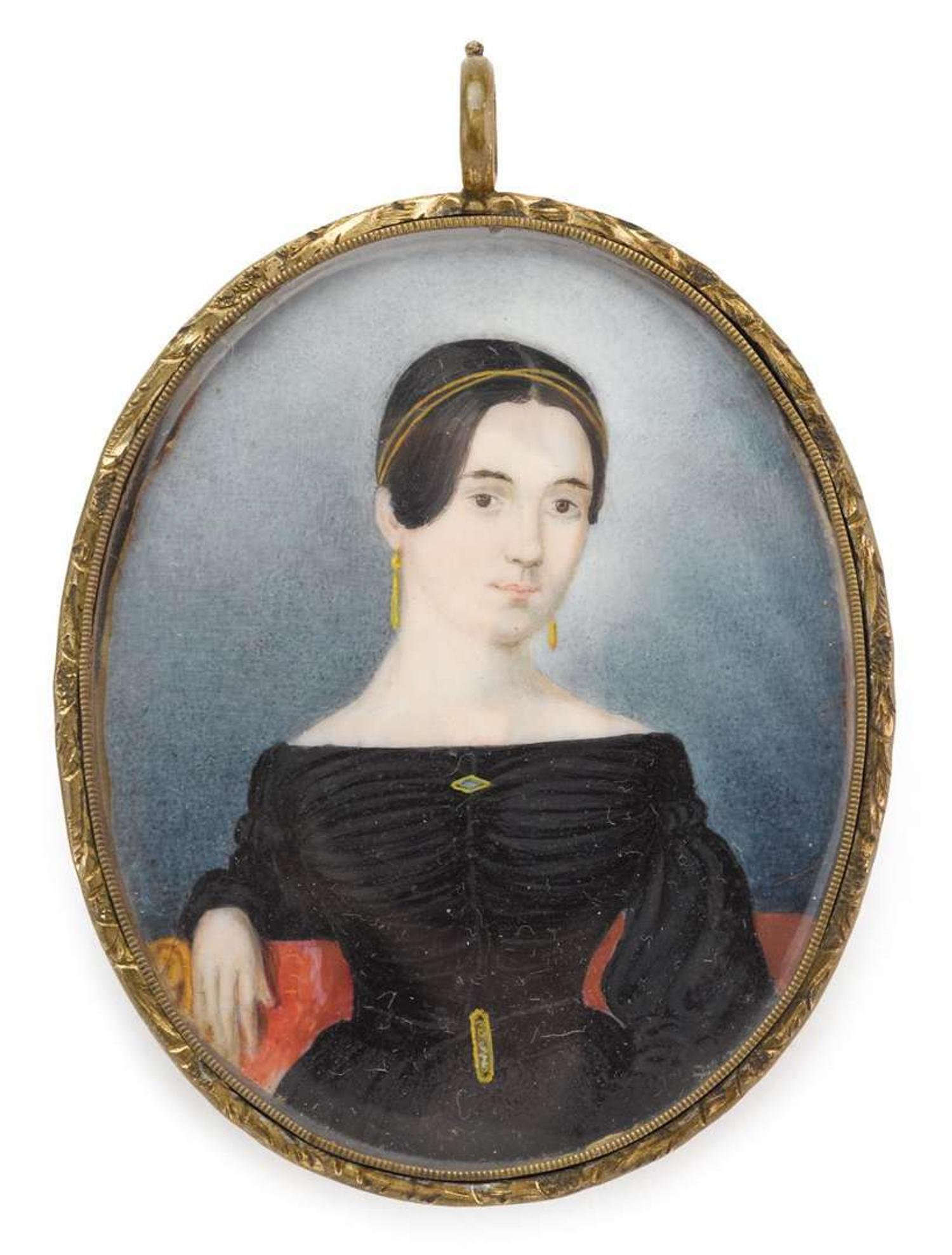 American School 19th century miniature portrait of a young lady seated on a red sofa, circa 1840