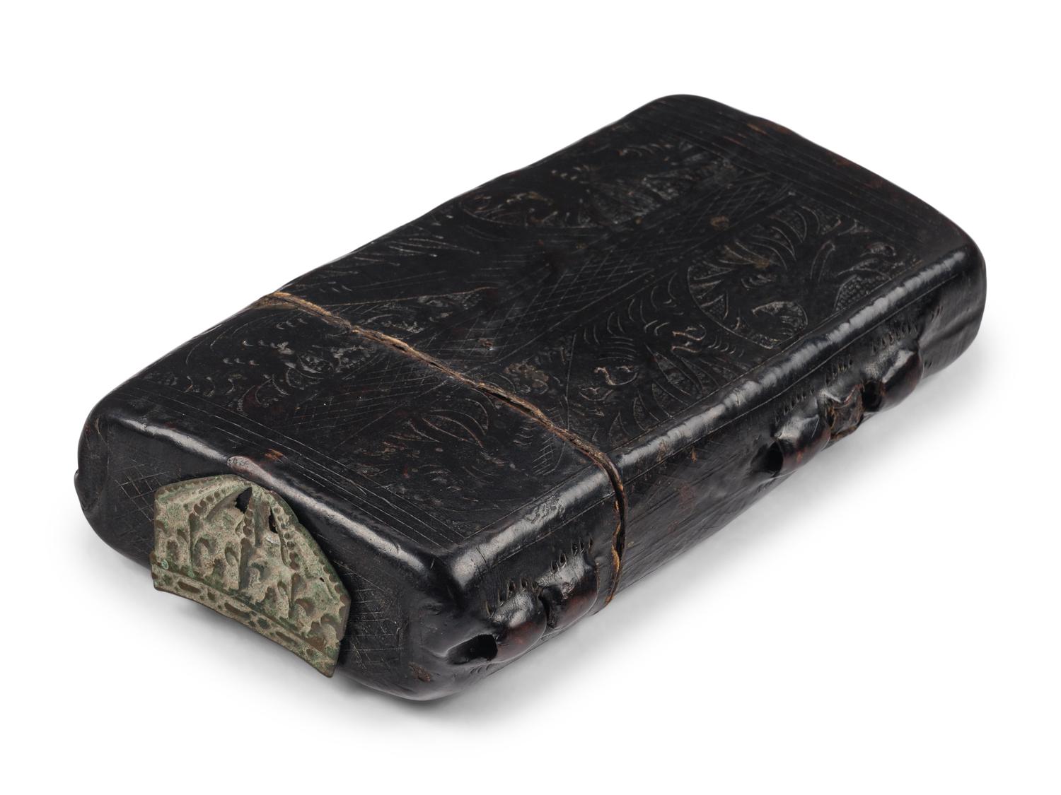 A BOOK BOX Book box, dark brown cuir-ciselé tooled leather [Austria (?), c. 1475-1500]