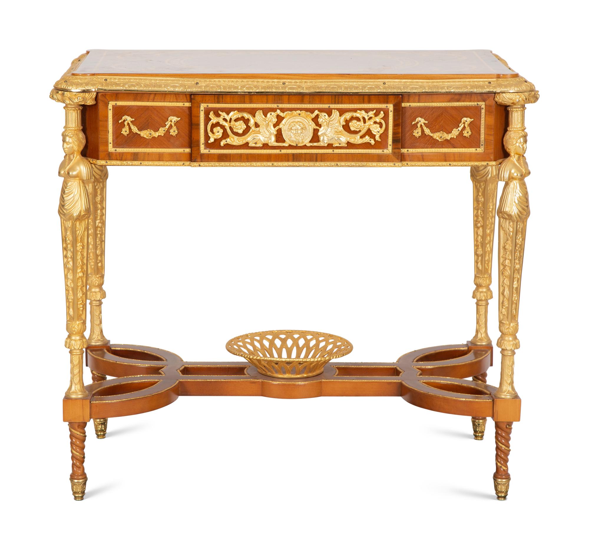 A Louis XVI Style Gilt Bronze Mounted Marquetry Table After the Model by Adam Weisweiler