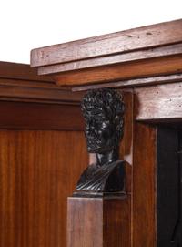 A Pair of Italian Parcel Ebonized Walnut Bookcases