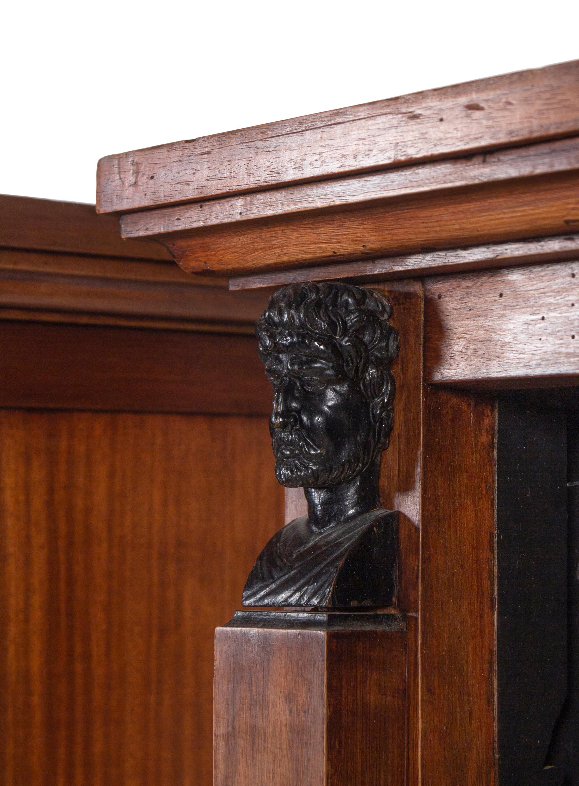 A Pair of Italian Parcel Ebonized Walnut Bookcases