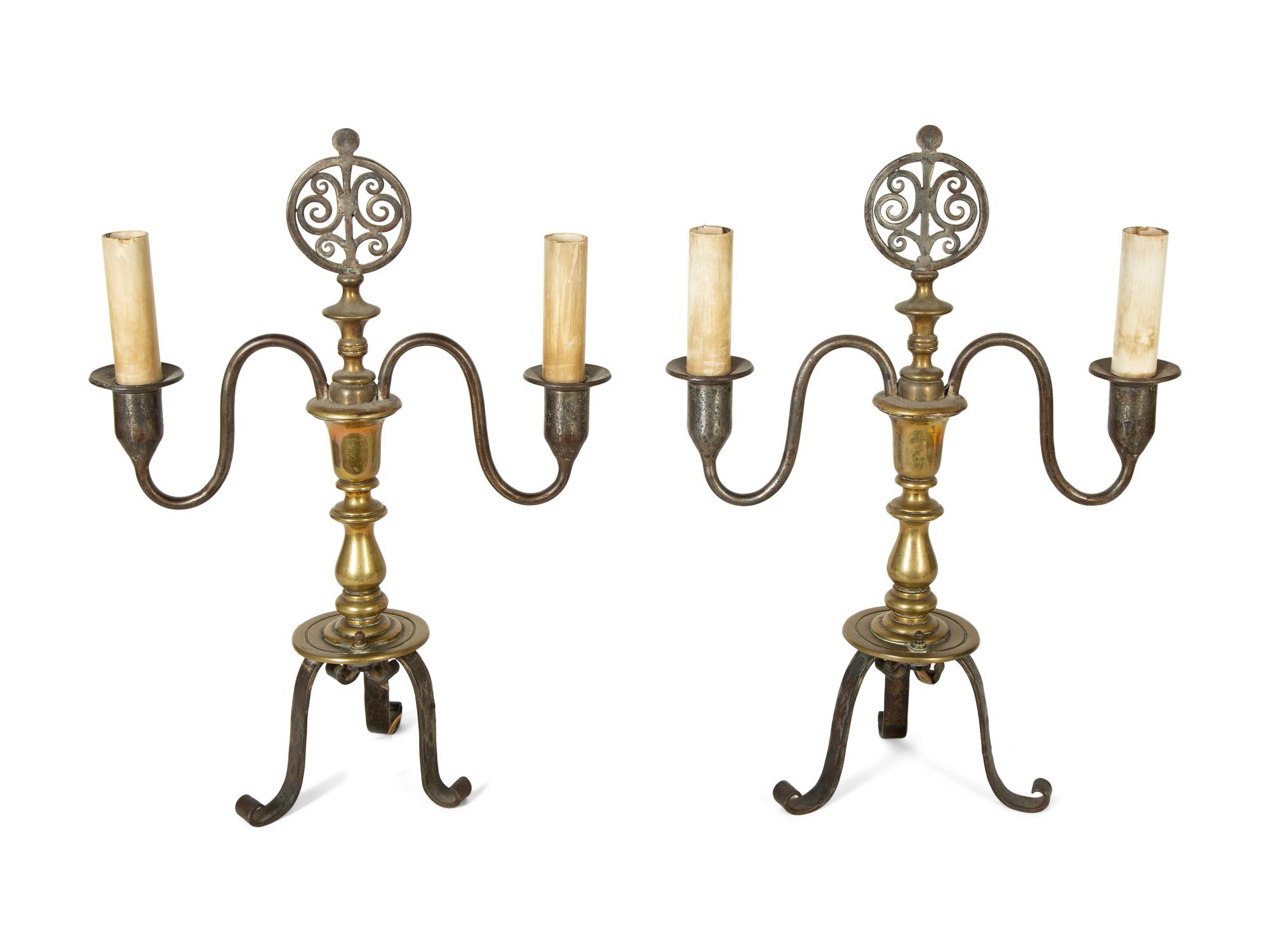 A Pair of Steel and Brass Candelabra Converted to Electricity