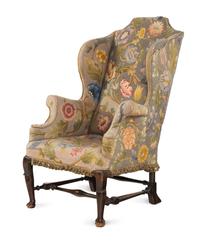 A Queen Anne Beechwood and Pine Wingback Armchair