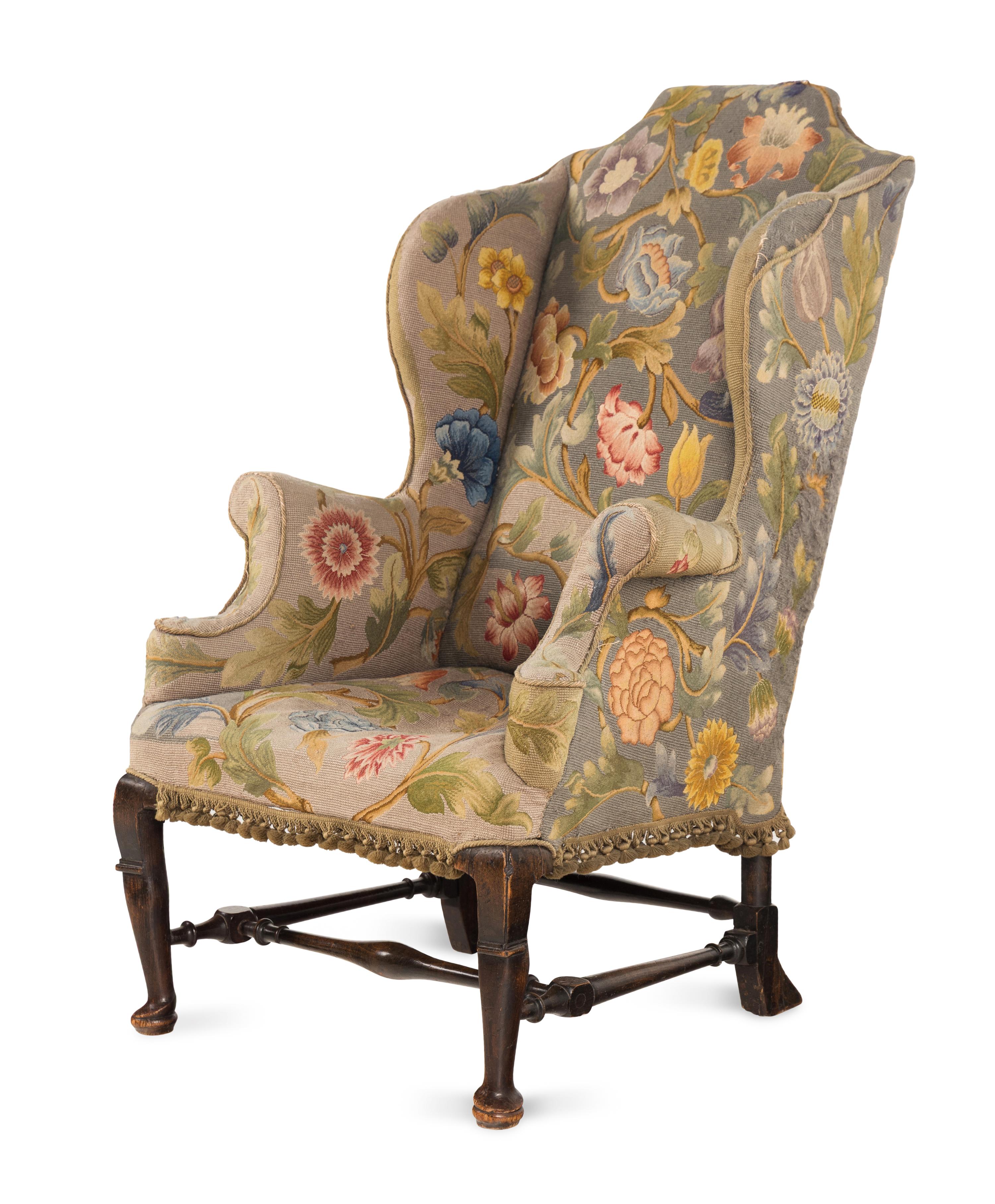 A Queen Anne Beechwood and Pine Wingback Armchair