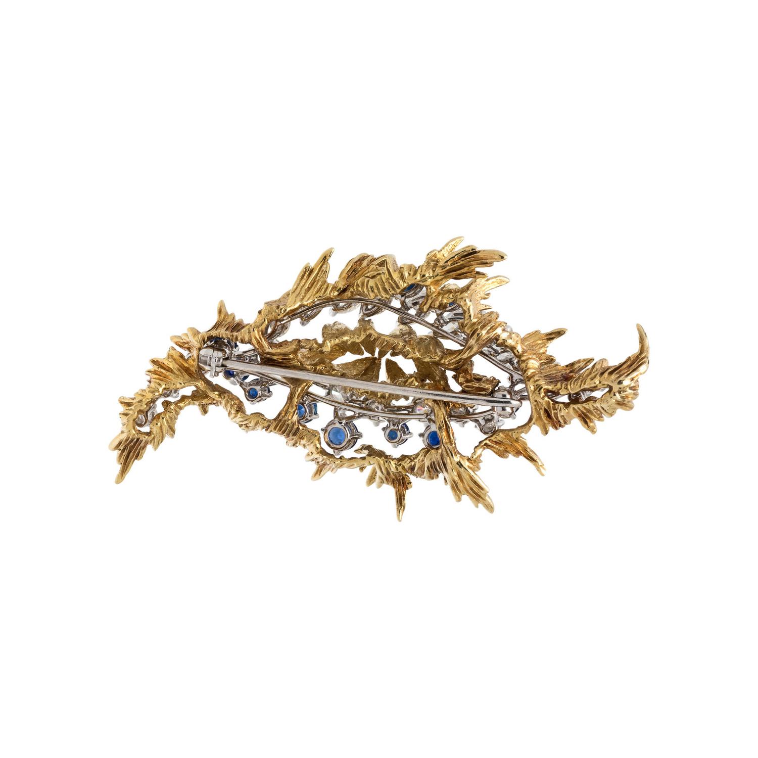 DIAMOND AND SAPPHIRE BROOCH WITH YELLOW GOLD JACKET