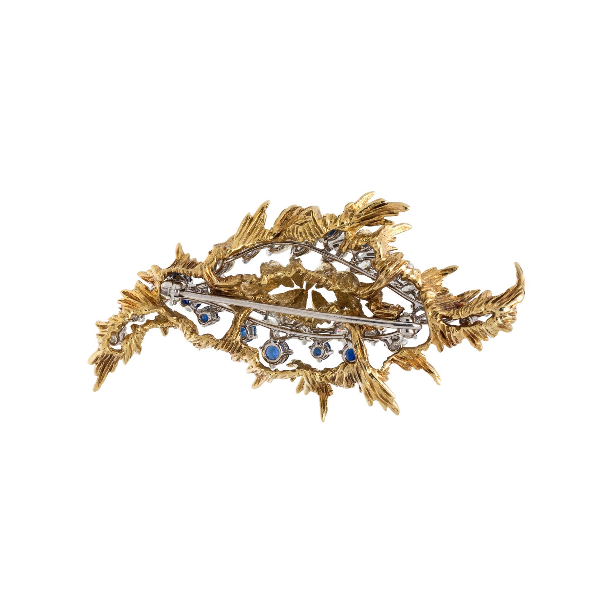 DIAMOND AND SAPPHIRE BROOCH WITH YELLOW GOLD JACKET