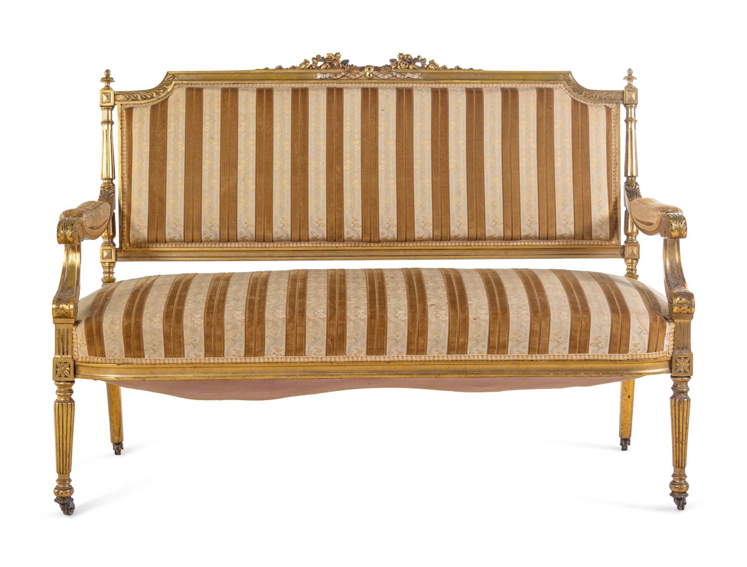 A Louis XVI Style Carved Giltwood Settee and Fauteuil