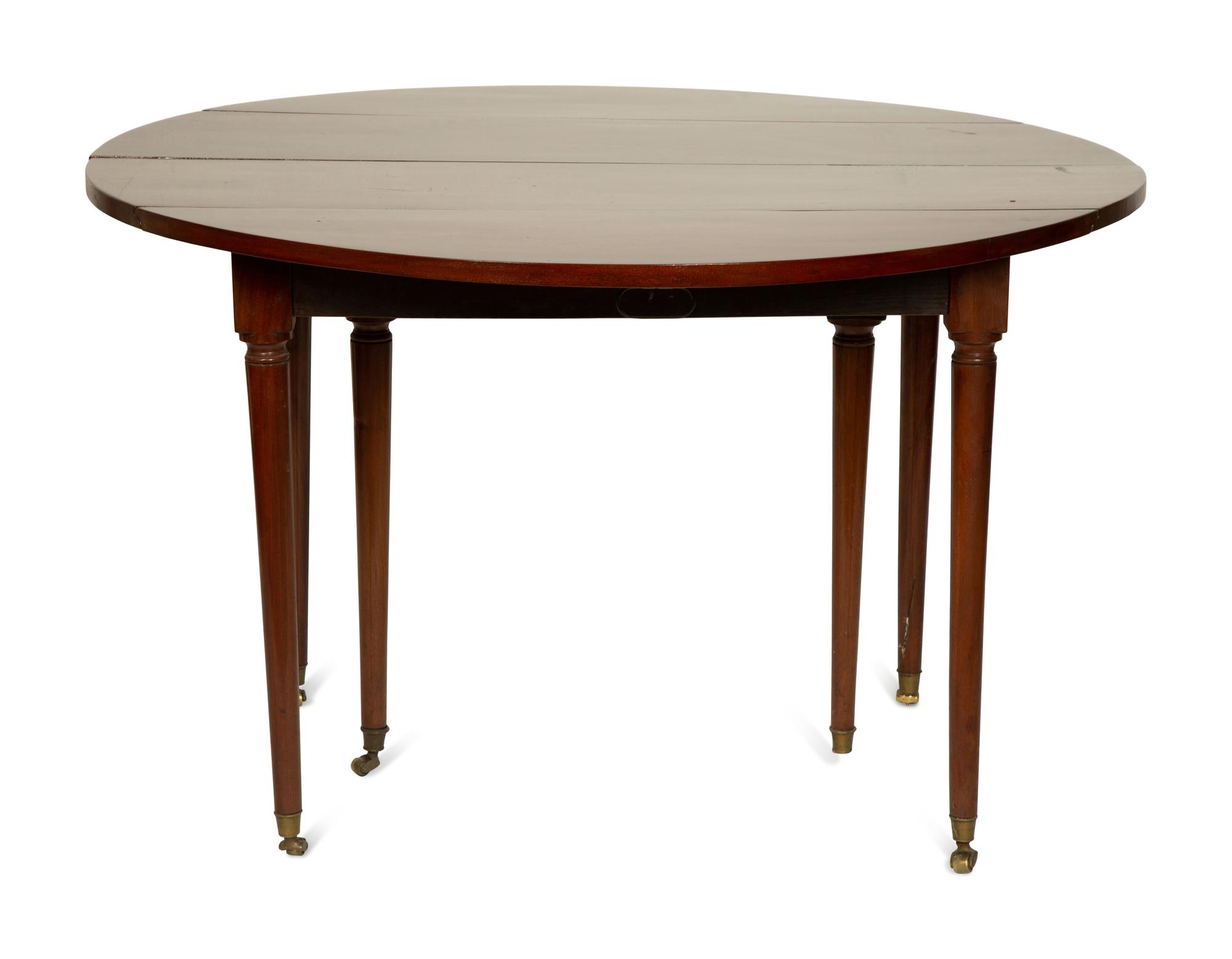 A Directoire Mahogany Drop-Leaf Dining Table