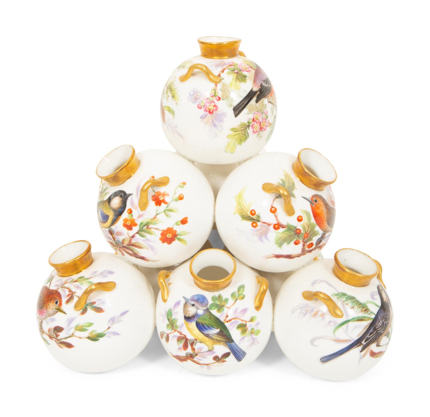 A Royal Worcester Porcelain Multi-stack of Ten Vases with Hand Painted Bird Decoration