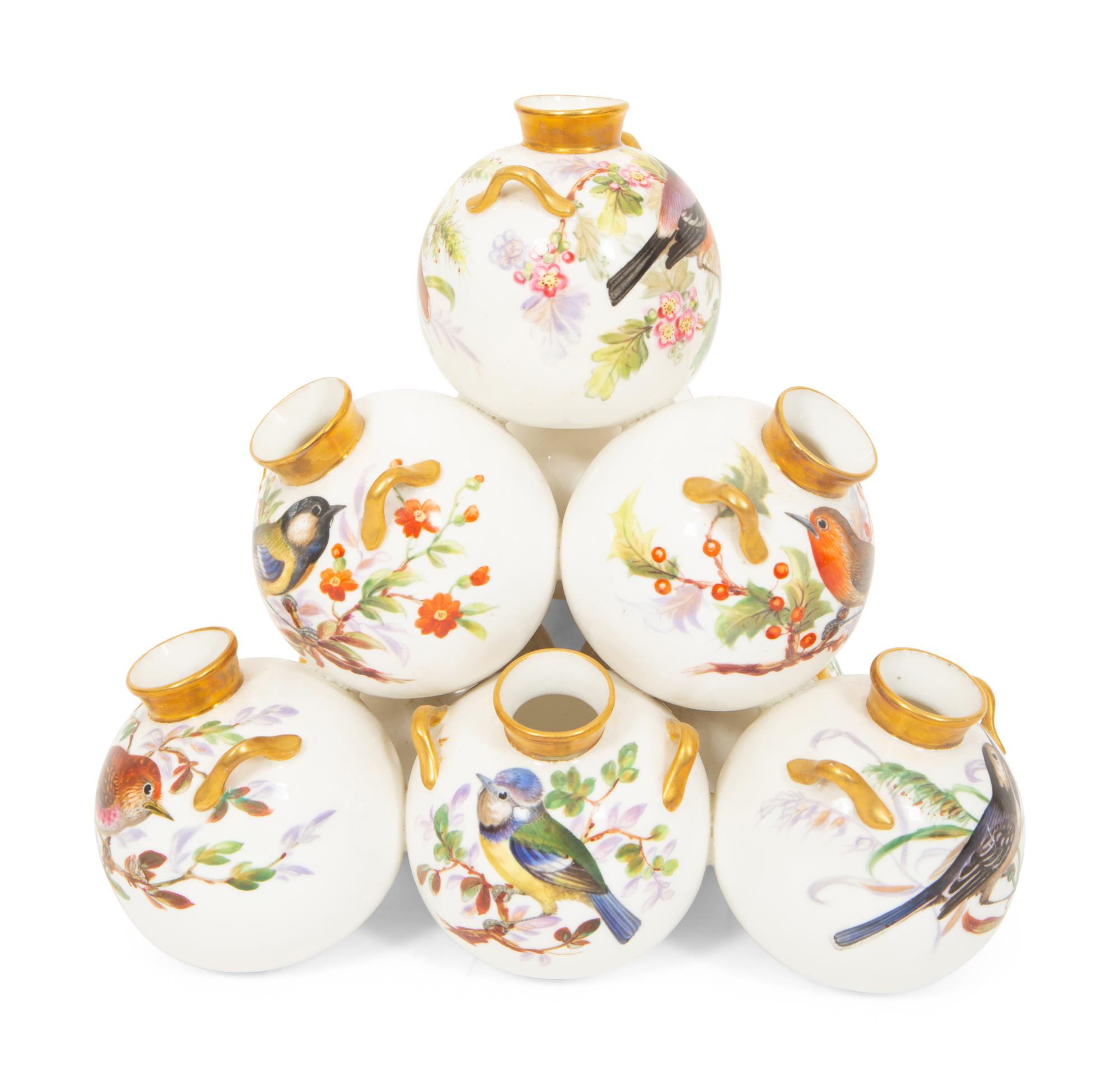 A Royal Worcester Porcelain Multi-stack of Ten Vases with Hand Painted Bird Decoration