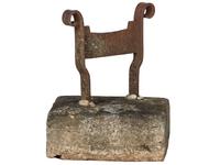 A Wrought Iron Boot Scrape with Stone Base
