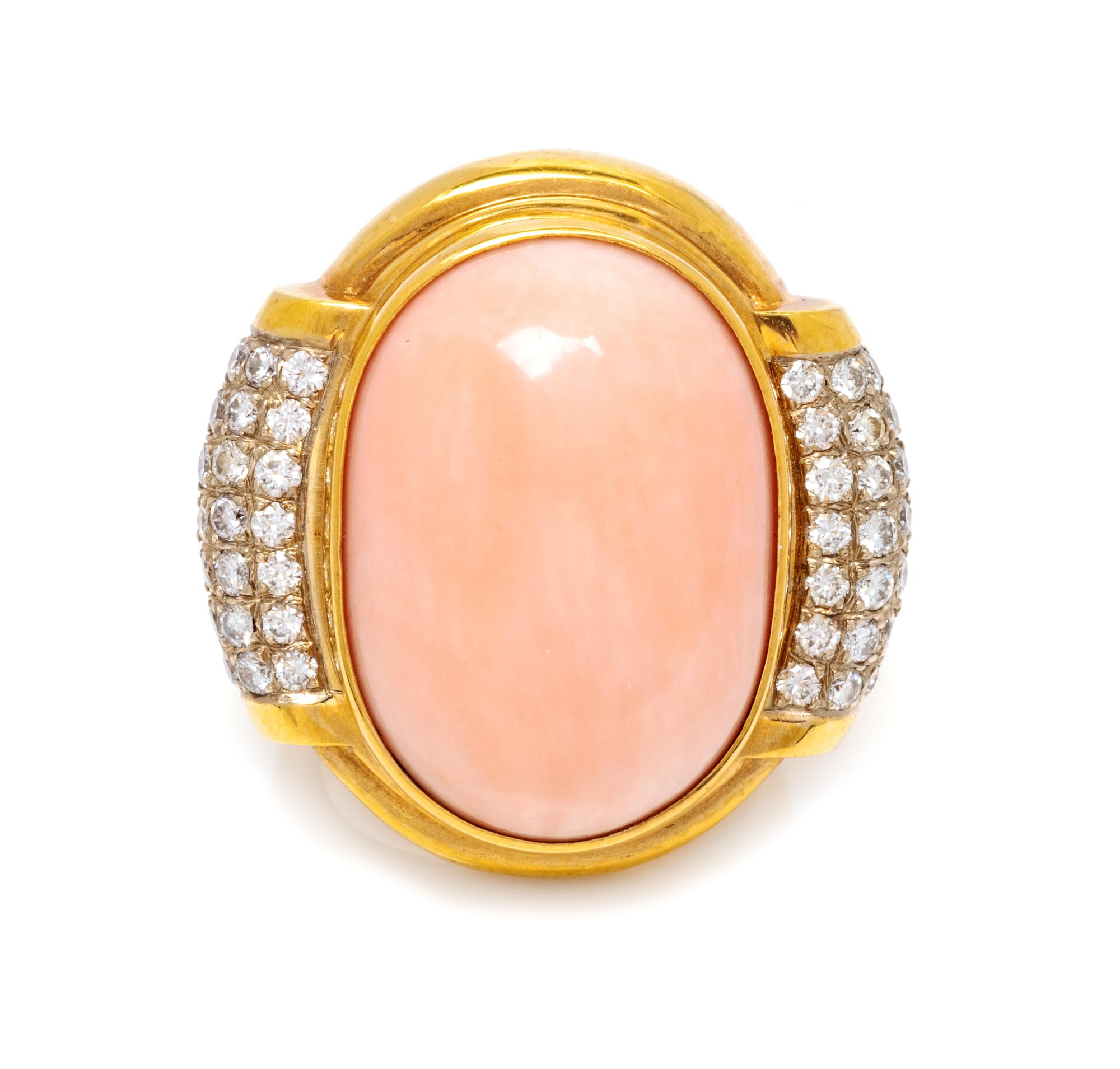 An 18 Karat Yellow Gold, Angel Skin Coral and Diamond Ring, Susan Berman, 18.00 dwts.