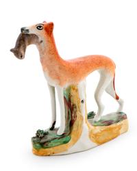 A Staffordshire Figure of a Greyhound with Squirel — 19TH CENTURY