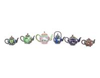 Six Chinese and Japanese Enameled Teapots