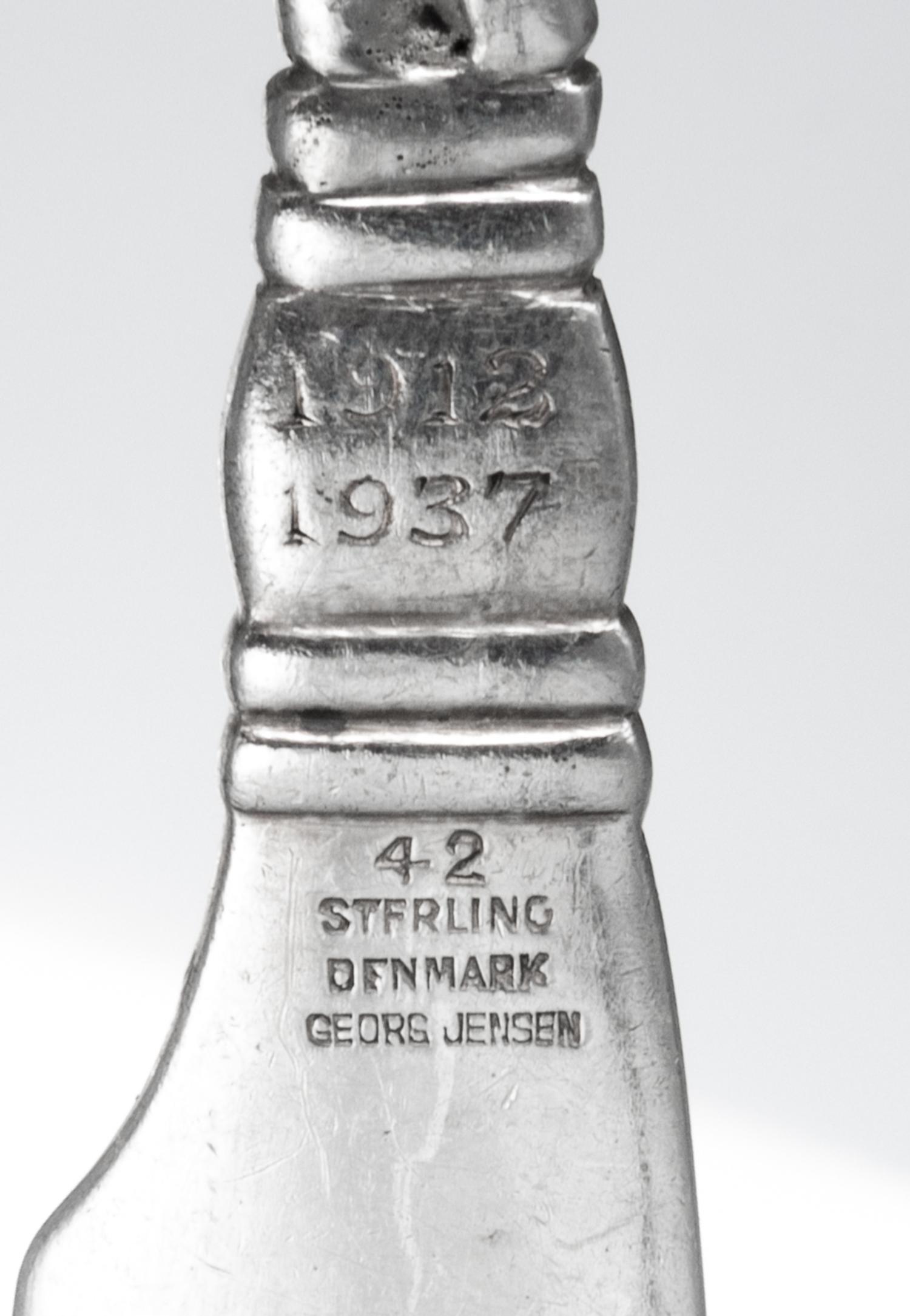 A Group of Silver Flatware Articles, various makers, 20th Century, comprising a set of five American silver ice-cream forks and a cockt