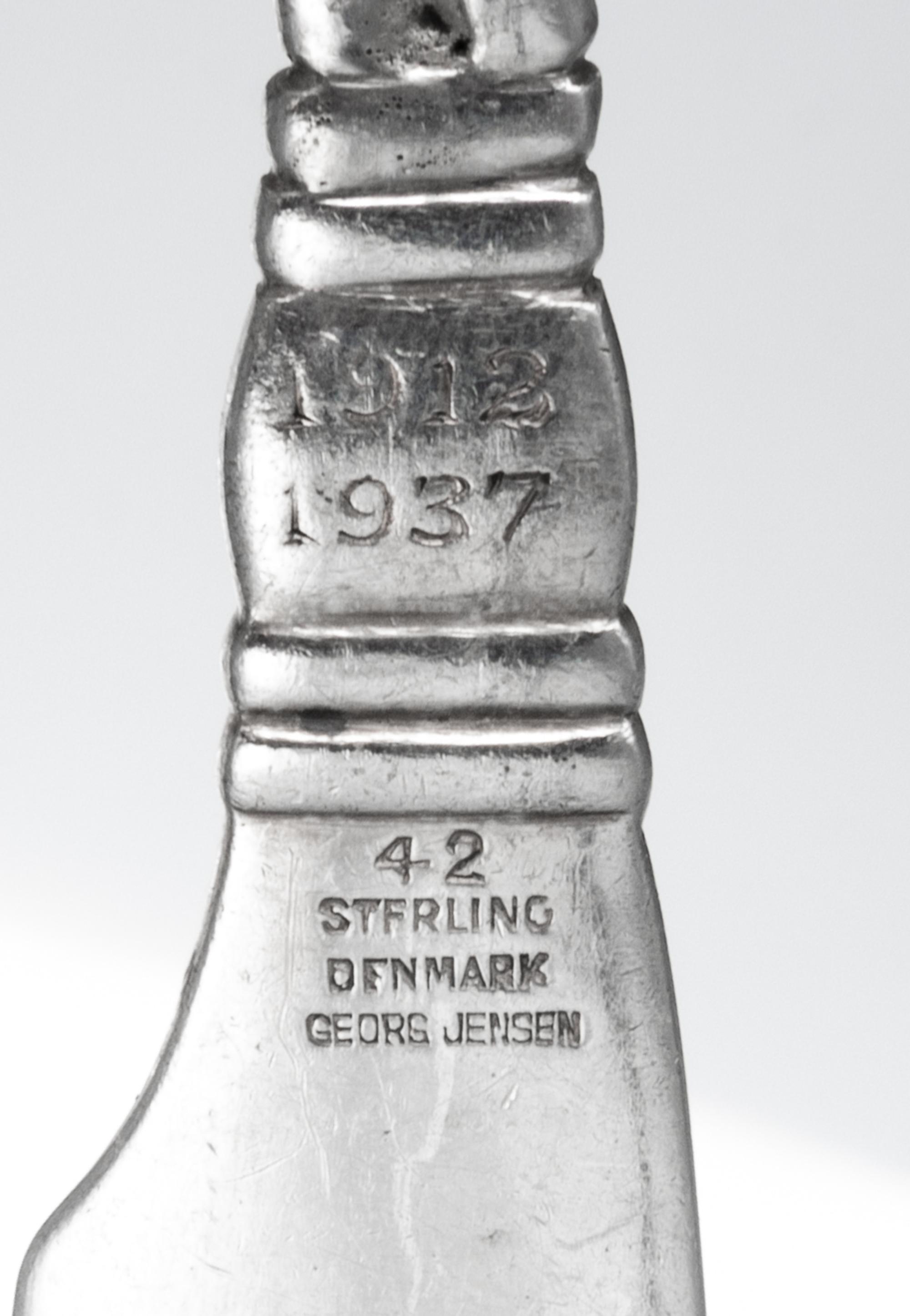 A Group of Silver Flatware Articles, various makers, 20th Century, comprising a set of five American silver ice-cream forks and a cockt